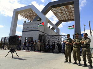 Members of Hamas' security forces stand guard in front of the Rafah border crossing in the southern Gaza Strip on September 16, 2013. [Said Khatib/Getty Images]
