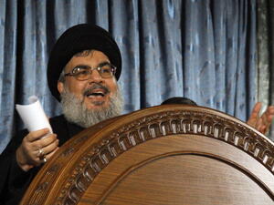The head of Lebanon's militant Shiite Muslim movement Hezbollah, Hassan Nasrallah speaks during a rare live appearance from Beirut's southern suburb neighbourhood of Rweiss on November 13, 2013. [Getty Images]