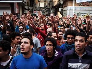 Demonstrators in downtown Cairo mark the second year anniversary of Mohamed Mahmoud. [GIANLUIGI GUERCIA/AFP/Getty Images]