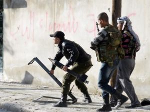 مقاتلون من المعارضة في سيف الدولة بحلب/أ.ف.ب