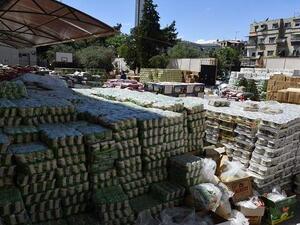 وصول أول قافلة محملة بالمساعدات الإنسانية إلى مدينة دير الزور