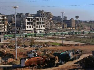 حافلات خضراء لإجلاء المسلحين وعائلاتهم من شرق حلب