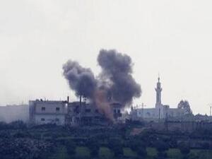 Smoke rises from shell explosions in the Syrian village of al-Jamlah. Photo: [REUTERS/Baz Ratner]