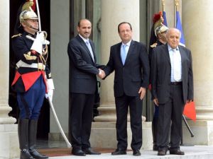 الرئيس الفرنسي هولاند ورئيس الائتلاف السوري المعارض جربا