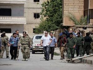  صفقة أدت إلى خروج مئات مقاتلي تنظيم “الدولة الإسلامية” مع عائلاتهم من الرقة 