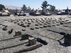 الكشف عن أسلحة ثقيلة ومتوسطة كانت بحوزة المسلحين في مستودعات تحت الأرض