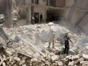 Syrian rescuers search the rubble of a destroyed building following a reported Syrian government forces attack at the Tariq al-Bab neighborhood in the rebel-held area of Aleppo on June 20, 2016. (AFP/Thaer Mohammed) Syrian rescuers search the rubble of a destroyed building following a reported Syrian government forces attack at the Tariq al-Bab neighborhood in the rebel-held area of Aleppo on June 20, 2016. (AFP/Thaer Mohammed)