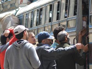 Evacuees board buses with their belongings on top as Syrian rebels and their families were being evacuated from the town of Yalda on the outskirts of Damascus. (AFP/ File Photo)