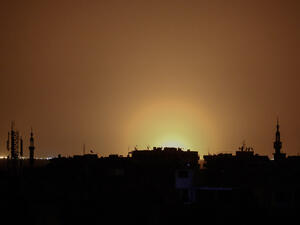 Flames rise into the night sky from a Damascus airport believed to have been hit by an Israeli airstrike, April 27 2017. (AFP/Sameer Al-Doumy)