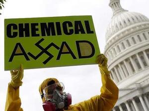 Syrian-American protesters outside the U.S. Capitol urging to strike Syria for using chemical weapons against civilians. (AFP/ File Photo) 