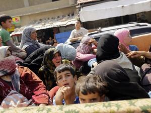 2,000 Syrian refugees reportedly stranded in Lebanon mountains. (AFP)