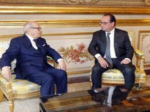  الرئيس التونسي الباجي قائد السبسي ونظيره الفرنسي فرنسوا أولاند