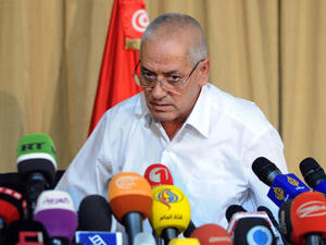 Tunisian mediator and Secretary General of the Tunisian General Labor Union (UGTT) Houcine Abbassi speaks during a press conference (Image credit: AFP)
