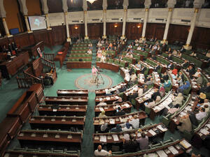 Tunisian MPs attend the first plenary session since the launch of all-party crisis talks on October 29, 2013 in Tunis. (Image credit: AFP).