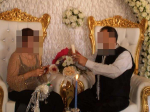 A picture of the newly-married couple, with faces blurred for privacy. (File)