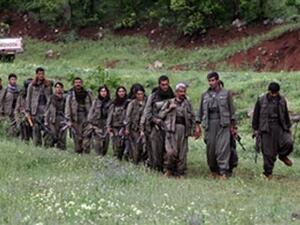 Kurdistan Workers' Party (PKK) fighters arrive in the northern Iraqi city of Dohuk on May 14, 2013, after leaving Turkey as part of a peace drive with Ankara. (AFIN HAMED/AFP/Getty Images)