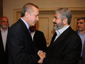 الرئيس التركي أردوغان ورئيس المكتب السياسي لحركة حماس خالد مشعل