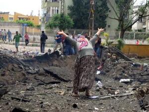 Turkish women in distress at the site of bomb explosion on the Syria border