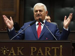 Turkish Prime Minister and the leader of Turkey's ruling party, the Justice and Development Party (AK Party) Binali Yildirim delivers a speech during a meeting of the AK Party at the Grand National Assembly of Turkey in Ankara, on June 28, 2016. (AFP/Adem Altan)