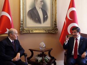 Prime Minister Ahmet Davutoglu, right, and Nationalist Movement Party, MHP, leader Devlet Bahceli during a meeting in Ankara, July 14, 2015. (AFP/Adem Altan)