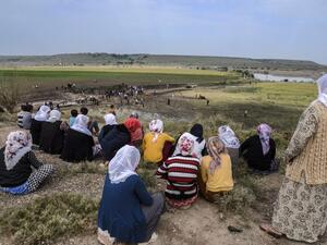 Women look at a huge crater after a powerful blast on May 13, 2016 in the area of Sarikamis on the outskirts of the majority Kurdish city of Diyarbakir. (AFP/Ilyas Akengin) Women look at a huge crater after a powerful blast on May 13, 2016 in the area of Sarikamis on the outskirts of the majority Kurdish city of Diyarbakir. (AFP/Ilyas Akengin)