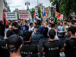 Turkish anti-riot police officers block the street on June 4, 2016 as protesters shout slogans against Germany and hold placards reading "We do not do genocide" in front of the German consulate in Istanbul after the German parliament recognised as genocide the massacres of Armenians under the Ottoman Empire. (AFP/Ozan Kose) Turkish anti-riot police officers block the street on June 4, 2016 as protesters shout slogans against Germany and hold placards reading "We do not do genocide" in front of the German consulate in Istanbul after the German parliament recognised as genocide the massacres of Armenians under the Ottoman Empire. (AFP/Ozan Kose)