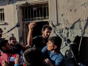Relatives of injured people react at the site after a rocket hit a house on May 5, 2016 in Kilis. (AFP/Stringer) Relatives of injured people react at the site after a rocket hit a house on May 5, 2016 in Kilis. (AFP/Stringer)