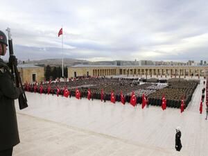 A Turkish Armed Forces officer (L) stands during a ceremony marking the 78th anniversary of the death of founder of the Republic of Turkey Mustafa Kemal Ataturk, at the mausoleum of Anitkabir in Ankara, on November 10, 2016. (AFP/Adem Altan)