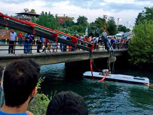 Rescuers worked overnight to pull people out of the water after the school bus plunged into a canal. (Twitter)