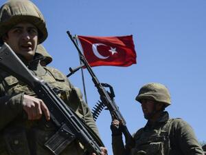 Turkish army soldiers standing guard on March 22, 2016 as Kurdish people wait in a hope to enter Cizre, a town subject to a curfew in the controversial operation against Kurdish rebels. (AFP/Ilyas Akengin) Turkish army soldiers standing guard on March 22, 2016 as Kurdish people wait in a hope to enter Cizre, a town subject to a curfew in the controversial operation against Kurdish rebels. (AFP/Ilyas Akengin)