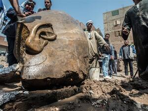 The Egyptian expedition working on the groundwater treatment project at the Kom Ombo Temple in Aswan discovered parts of a statue of King Ramses II. (AFP/ File Photo)
