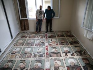 Abdulsettar al-Sattuf, right, is seen with his mosaic project depicting 36 Ottoman sultans. (Twitter/Anadolu)