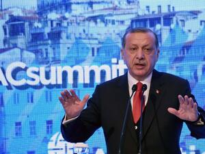 Turkish President Recep Tayyip Erdogan gestures as he gives a speech on April 28, 2017 during the Atlantic Council summit in Istanbul. (AFP/Ozan Kose)