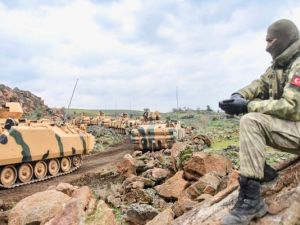 Turkish army tanks and troops near Hassa in Hatay province, ready to push into Syria (AFP/ File photo)