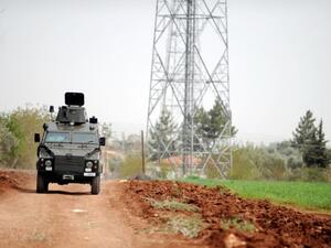 A Turkish army vehicle patrols near the border with Syria in Kilis, on 11 April 2012. (AFP/Bulent Kilic)