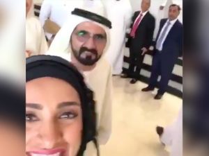 Sheikh Mohammed briefly popped into the frame as a woman filmed a selfie video, which then went viral on Instagram. (Screenshot via Instagram)