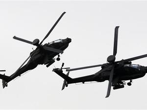 Helicopters of the UAE armed forces fly during a military show at the opening of the International Defense Exhibition and Conference (IDEX) at the Abu Dhabi National Exhibition Centre in the Emirati capital on February 22, 2015. (AFP) Helicopters of the UAE armed forces fly during a military show at the opening of the International Defense Exhibition and Conference (IDEX) at the Abu Dhabi National Exhibition Centre in the Emirati capital on February 22, 2015. (AFP)