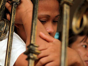 A Muslim maid from the Philippines waits to break her Ramadan fast at a shelter managed by Labour and Welfare officers after fleeing her employer's home due to mistreatment, August 13, 2010, in Dubai, United Arab Emirates (AFP)