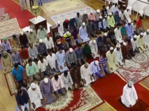 Maghrib prayers are held inside a UAE church hall on Friday (screenshot/Youtube)