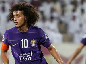 It was a close shave for striker Omar "Amoory" Abdulrahman's curls. (AFP/File)