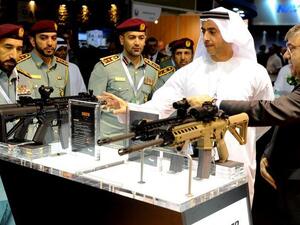 Military representatives of Dubai inspect the goods at the 2013 DSEi international arms fair. (Twitter)