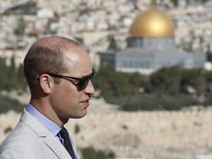 Britain's Prince William stands in Jerusalem's Mount of Olives overlooking the Old City with the golden dome of the Dome of the Rock mosque on June 28, 2018. (Thomas COEX / POOL / AFP)