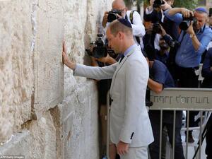 Britain's Prince William touches the Western Wall, the holiest site where Jews can pray, in Jerusalem's Old City today. (AFP/ File)