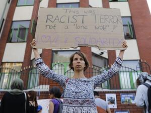 People attend a vigil outside Finsbury Park Mosque in north London on June 20, 2017, following a van attack on pedestrians nearby on June 19. Ten people were injured and a man also died at the scene after a van drove into a crowd of Muslim worshippers near a mosque in London in the early hours of Monday. (Tolga Akmen/AFP)