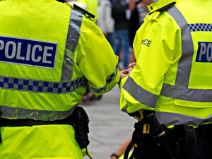British Police Officers in high visibility uniform on crowd control. (Shutterstock/ File Photo)