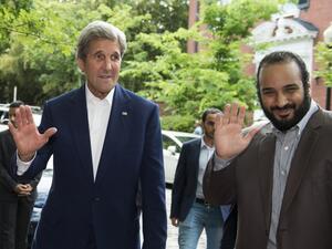 US Secretary of State John Kerry (L) greets Saudi Deputy Crown Prince Mohammed bin Salman outside Kerry's residence prior to their meeting on June 13, 2016, in Washington, DC. (AFP/Molly Riley)