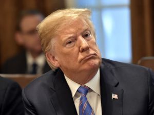 US President Donald Trump listens during a cabinet meeting on July 18, 2018, at the White House in Washington, DC. (Nicholas Kamm / AFP)