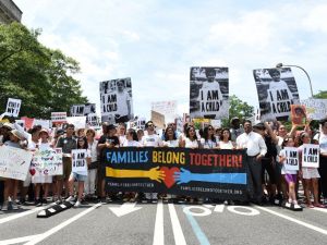 Actor Lin-Manuel Miranda and volunteers march during Families Belong Together Rally In Washington DC Sponsored By MoveOn, National Domestic Workers Alliance, And Hundreds Of Allies on June 30, 2018 in Washington, DC. (AFP/ File Photo)