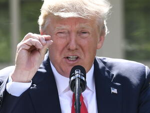 Around a quarter of residents in the Kingdom questioned by YouGov said the visit positively affected their impression of Trump, compared to 38 percent who said the visit made no difference. (AFP)