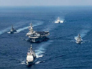 The incident happened Monday as the vessel attempted to draw closer to the USS Mahan (AFP)